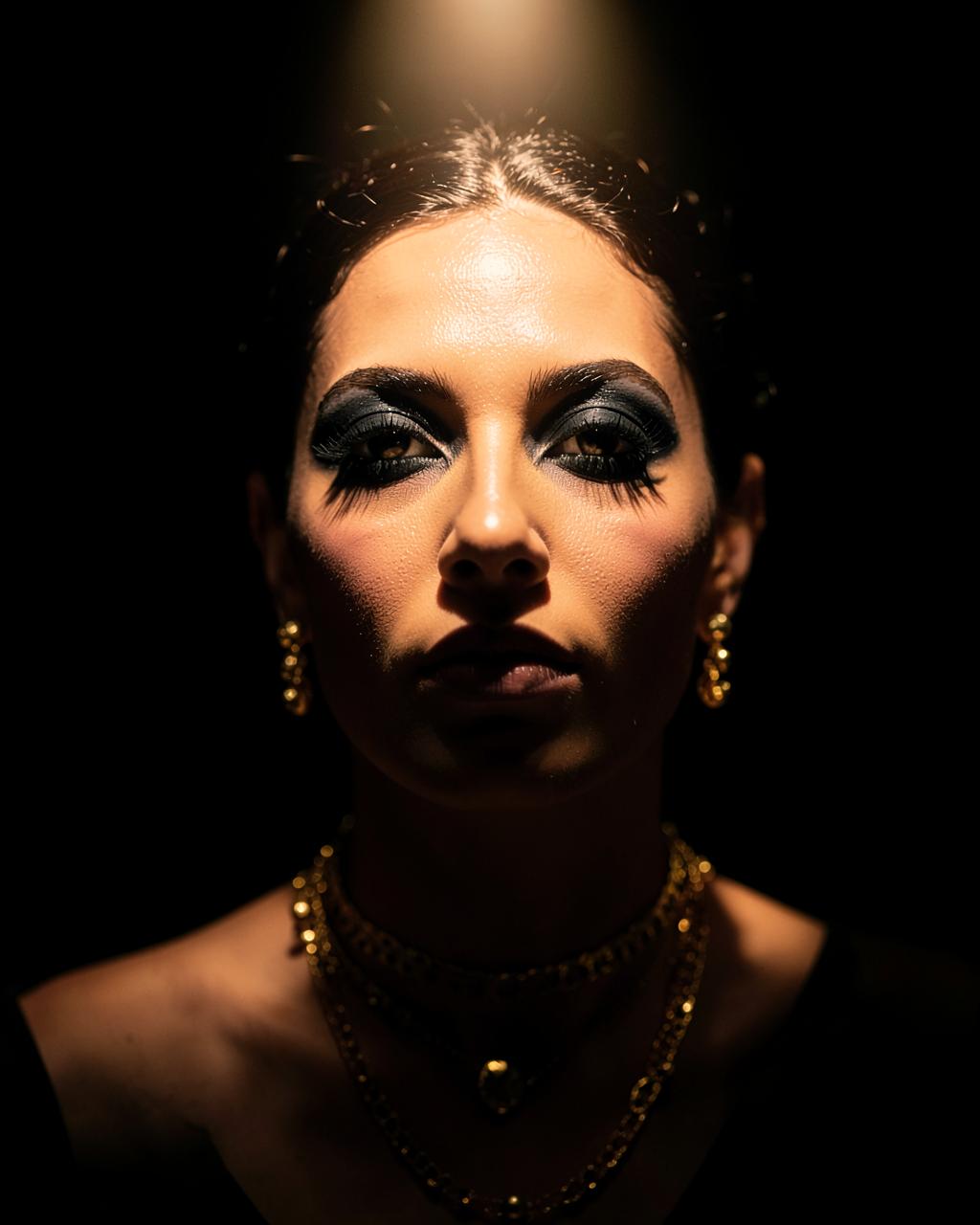 Cinematic portrait in gold and shadow